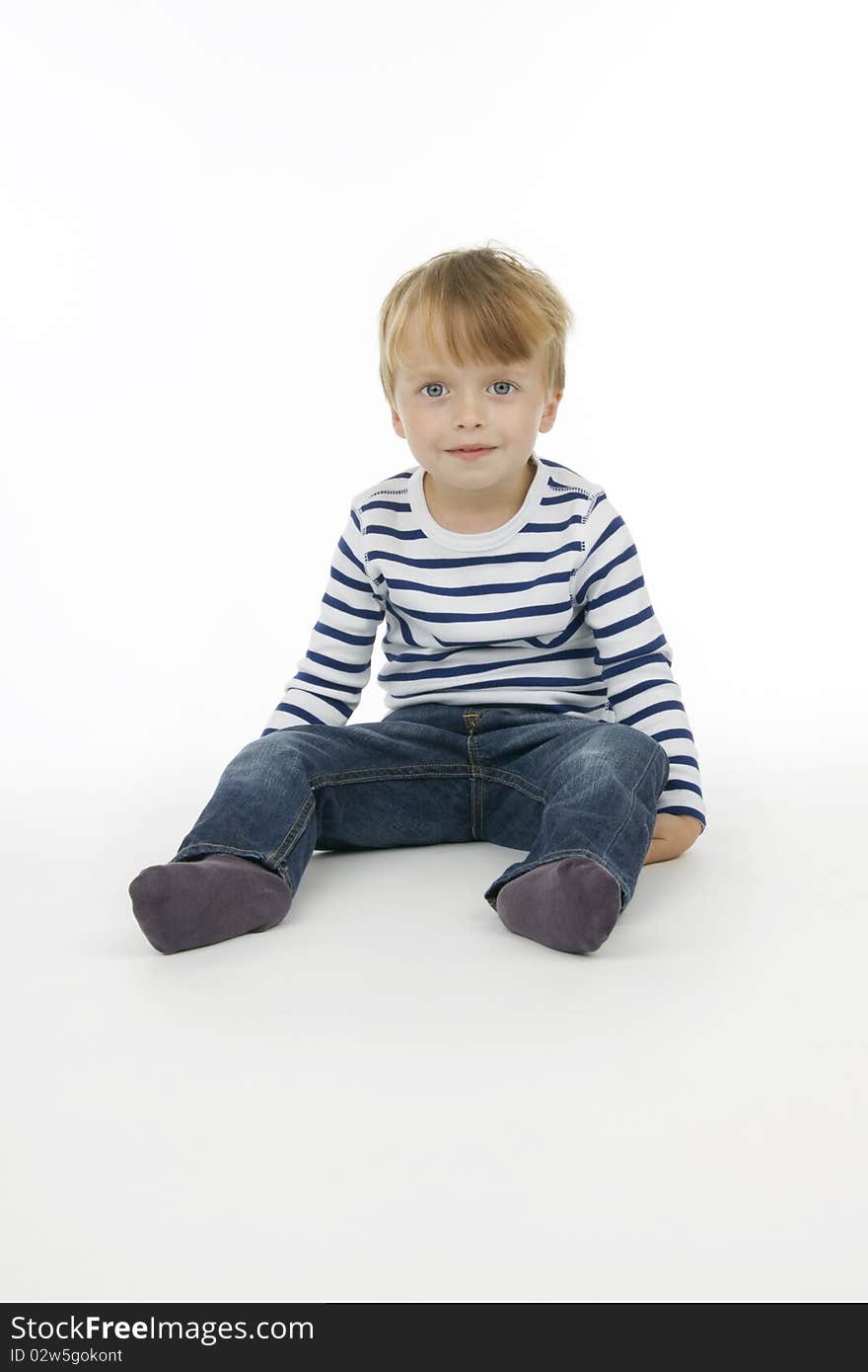 Child sit, on white background.