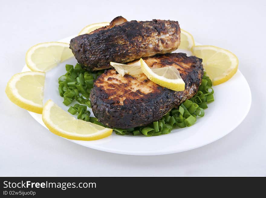 Roast salmon on white background