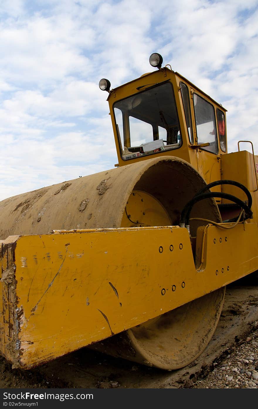 Yellow Roller closeup on a construction site