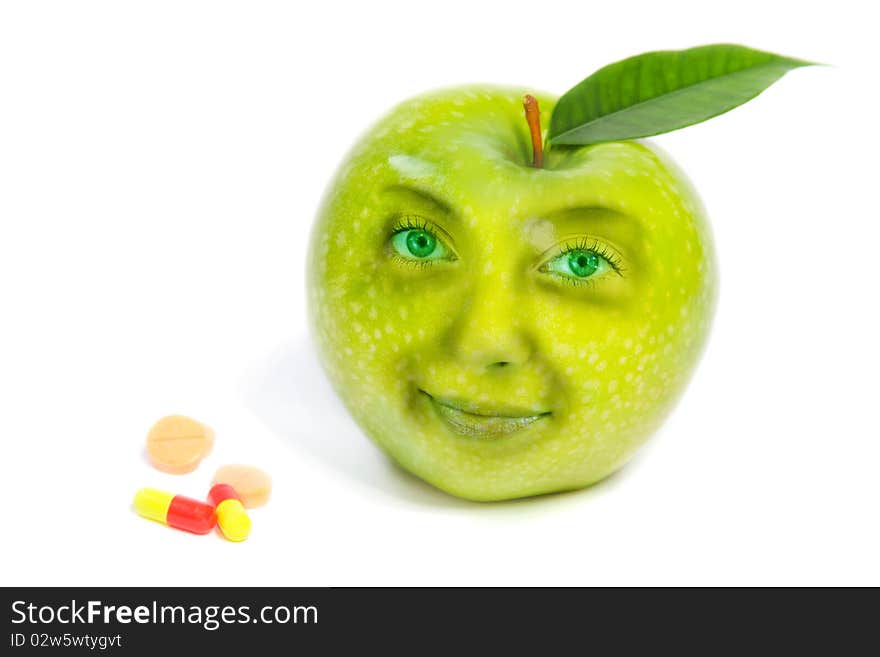 Green apple with human face and pills isolated on white background