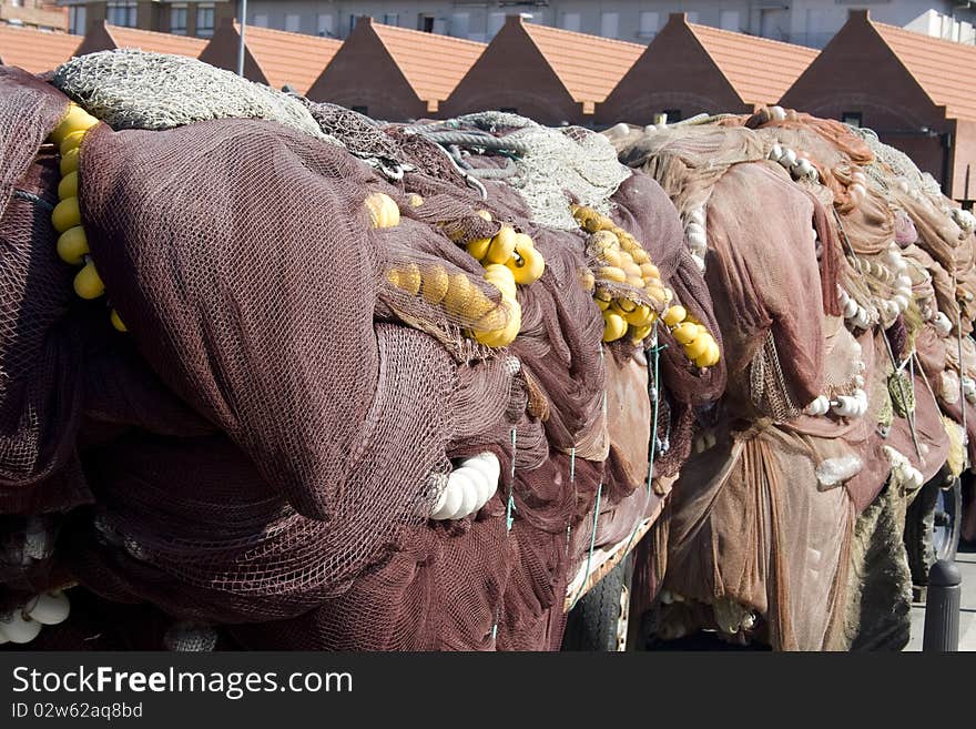 Fishing nets stacked outside the sea