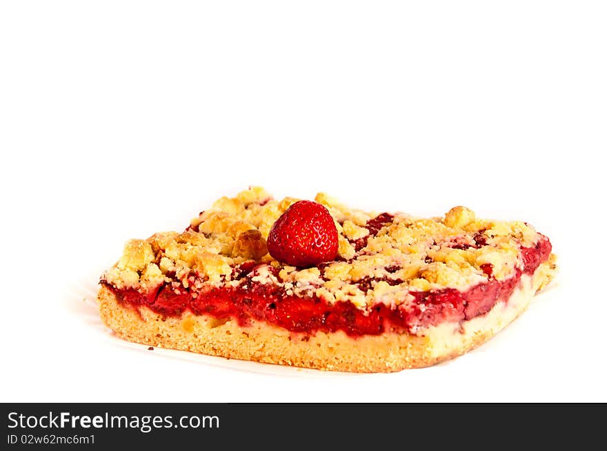 Piece of freshly baked strawberry cake decorated with a fruit. Piece of freshly baked strawberry cake decorated with a fruit