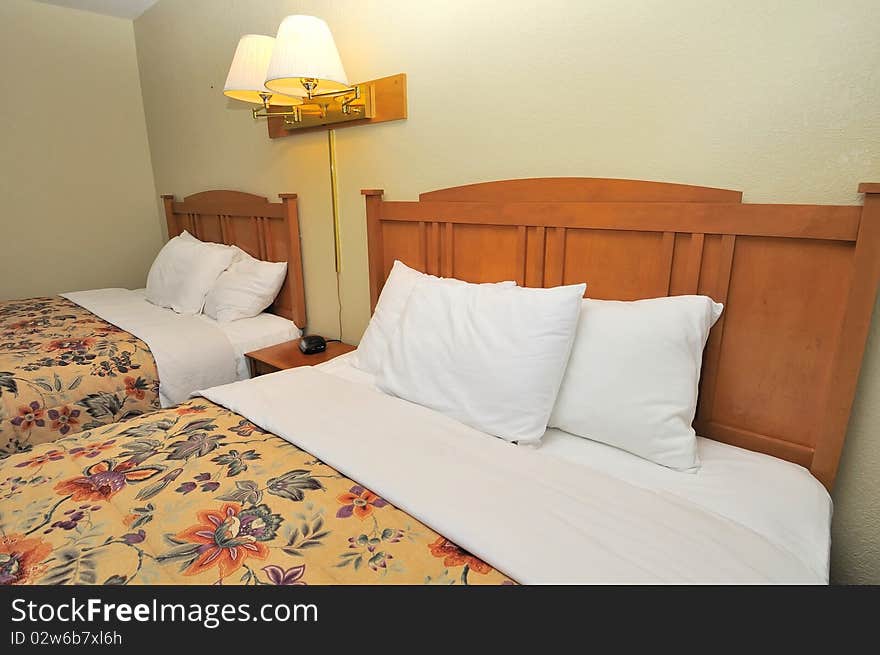 Close up of cosy beds in hotel. Suitable for concepts such as luxury, travel, tourism, vacation and holiday, and relaxation. Close up of cosy beds in hotel. Suitable for concepts such as luxury, travel, tourism, vacation and holiday, and relaxation.