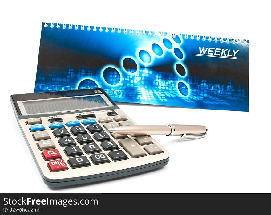 Calculator and a pen on a white background