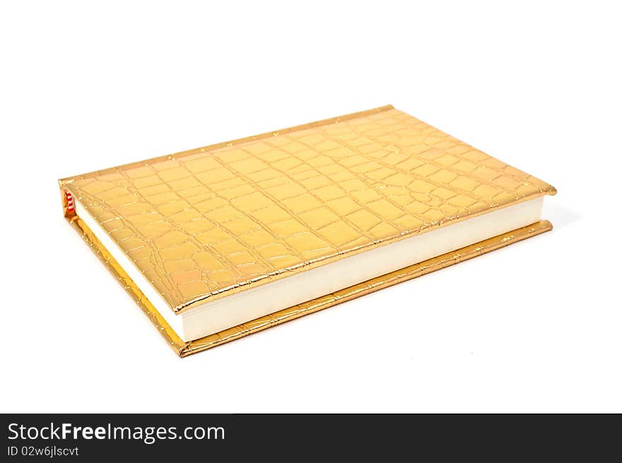 Gold diary on white background