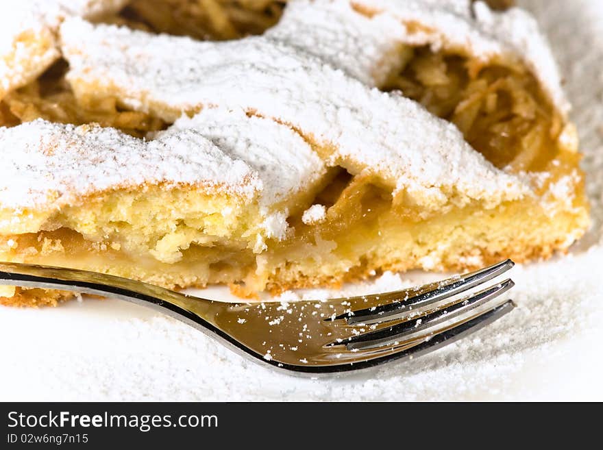 Slice of apple pie on plate.