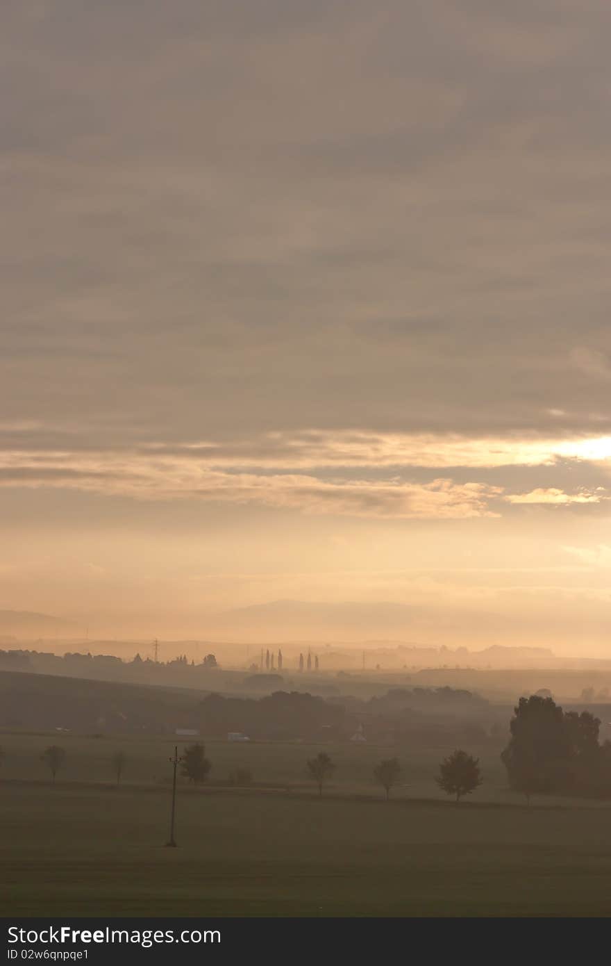 Sunrise natural landscape with fog