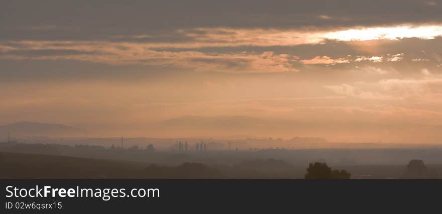 Sunrise natural landscape with fog