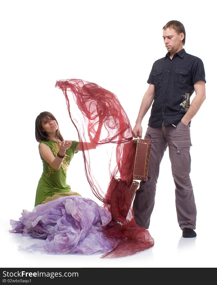 Boy and girl with suitcase on white background