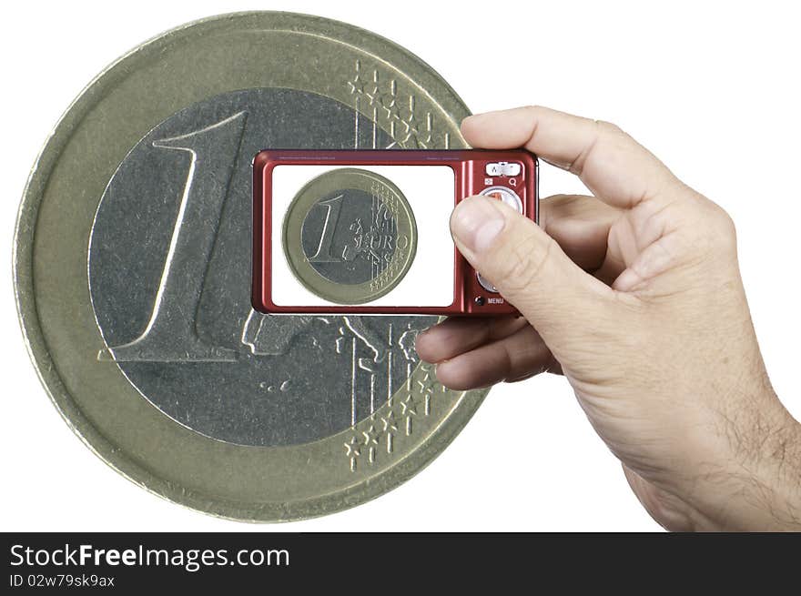 This image shows a camera photographing a euro. This image shows a camera photographing a euro