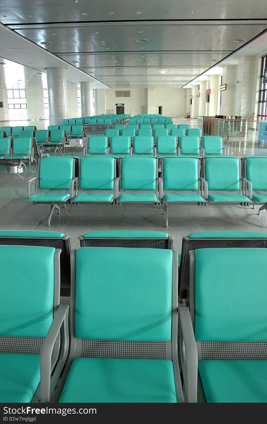 Group of seats in waiting room. Train station hall in Guangzhou, China.