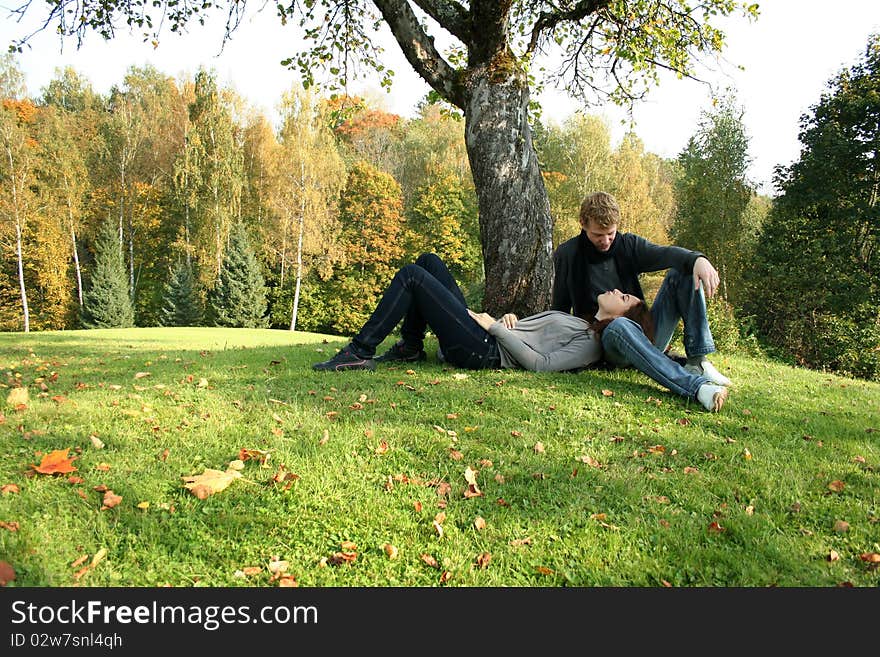 Beautiful couple having fun in autumn park. Beautiful couple having fun in autumn park