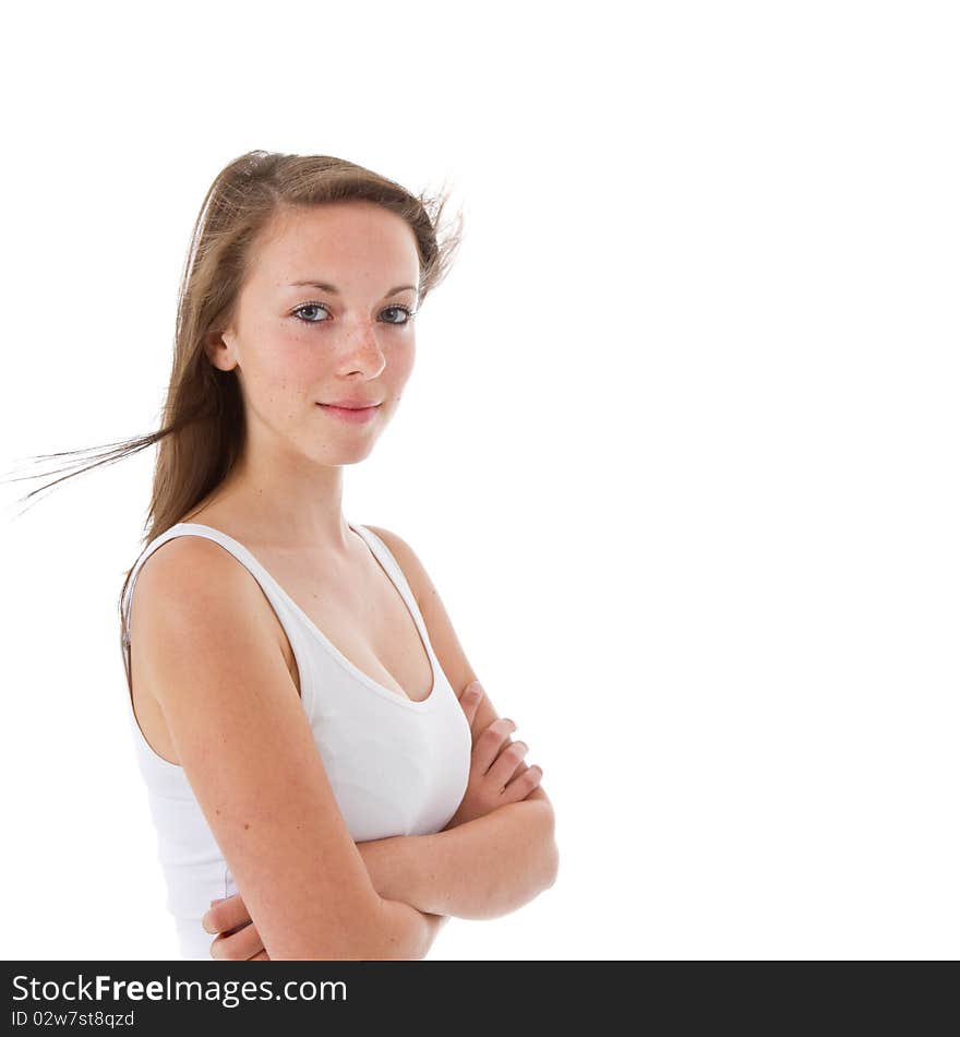 Young fresh beautiful teenage girl with nice long hair in a studio setting. Young fresh beautiful teenage girl with nice long hair in a studio setting.