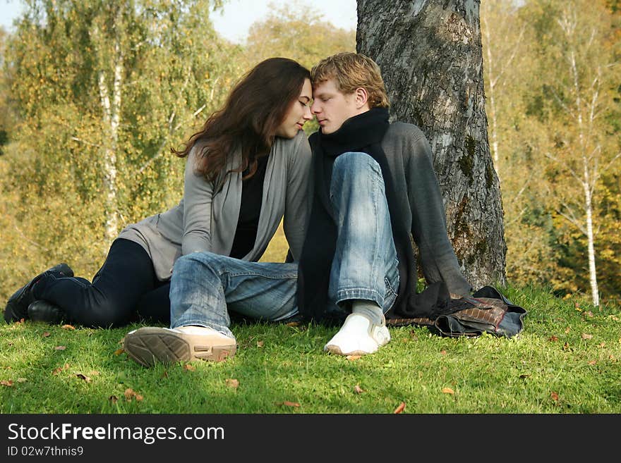 Beautiful couple having fun in autumn park. Beautiful couple having fun in autumn park