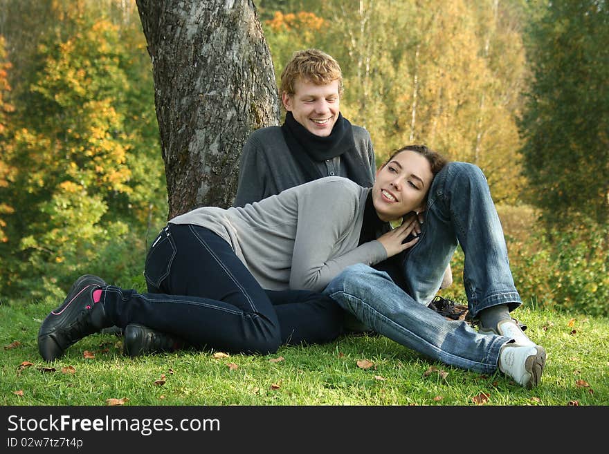 Beautiful couple having fun in autumn park. Beautiful couple having fun in autumn park