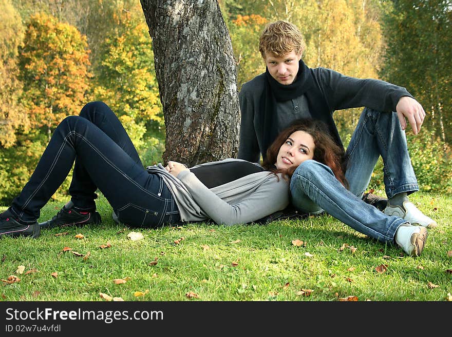 Beautiful couple having fun in autumn park. Beautiful couple having fun in autumn park