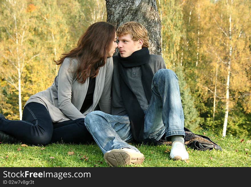 Beautiful couple having fun in autumn park. Beautiful couple having fun in autumn park