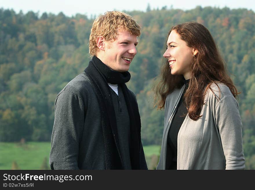 Beautiful couple having fun in autumn park. Beautiful couple having fun in autumn park