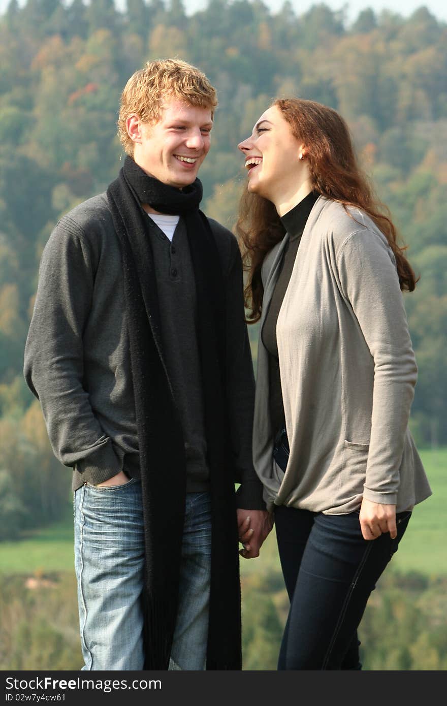 Beautiful couple having fun in autumn park. Beautiful couple having fun in autumn park