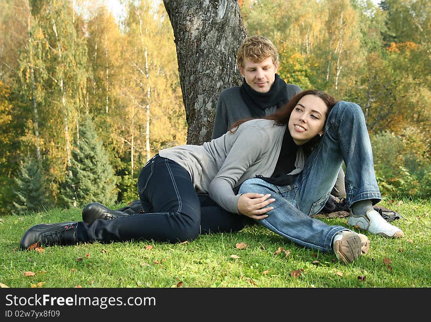 Beautiful couple having fun in autumn park. Beautiful couple having fun in autumn park