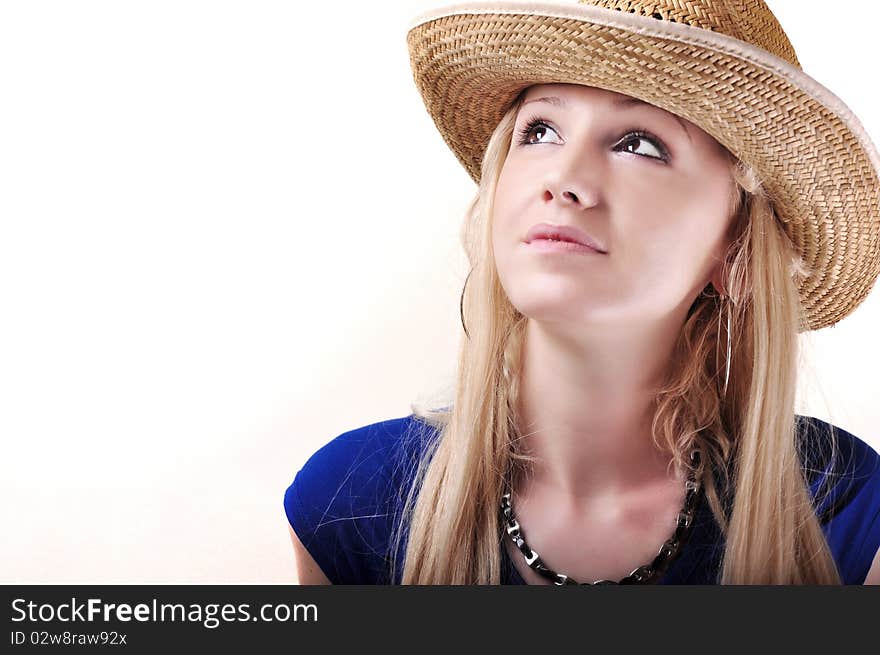 Pretty cowboy girl isolated on the white background