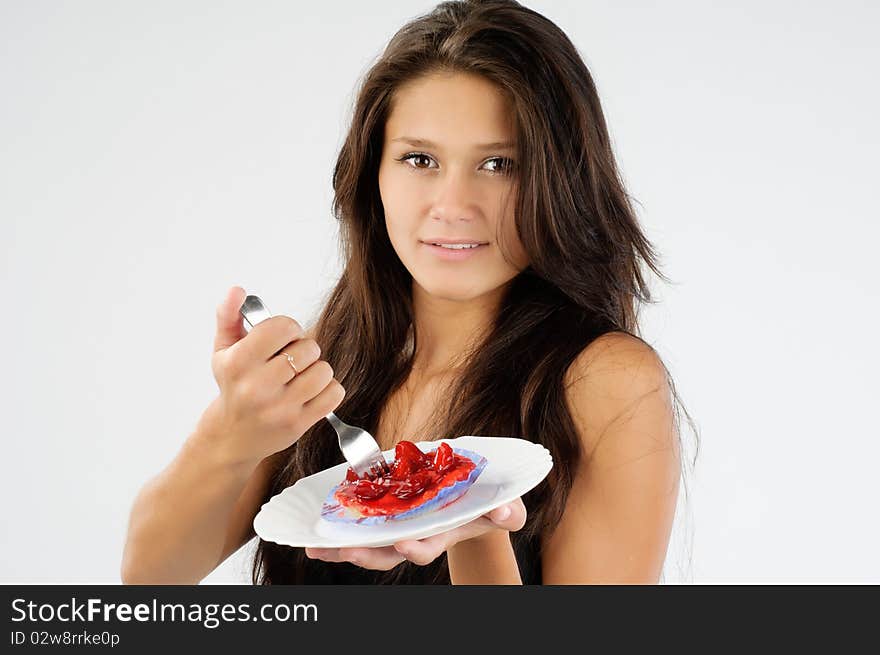 Cute young girl wanted tasty cake badly. Cute young girl wanted tasty cake badly