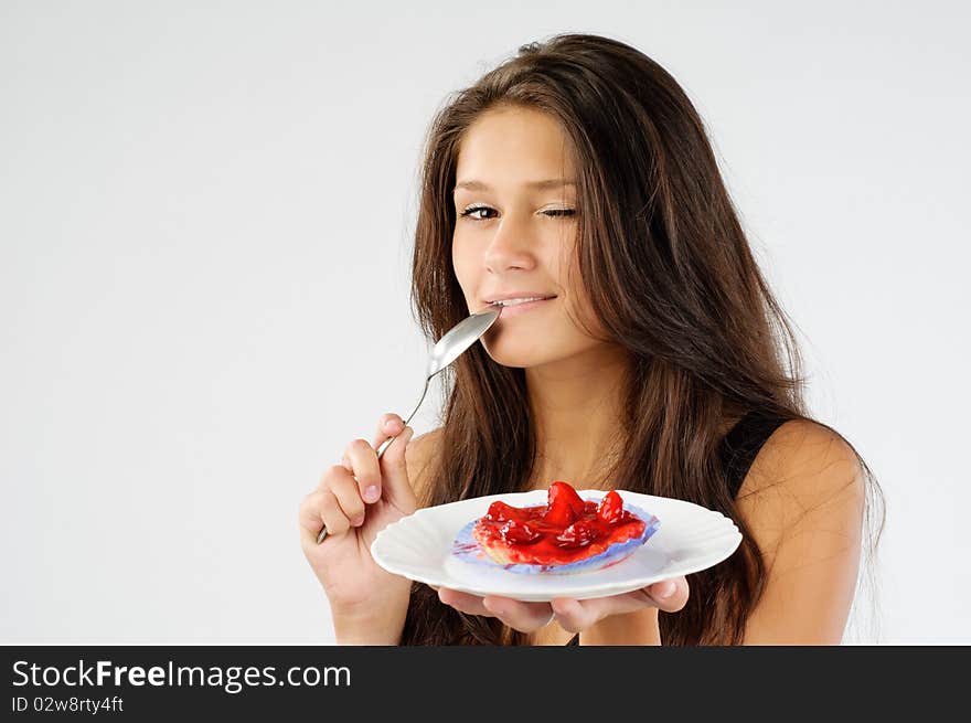 Cute young girl wanted tasty cake badly. Cute young girl wanted tasty cake badly