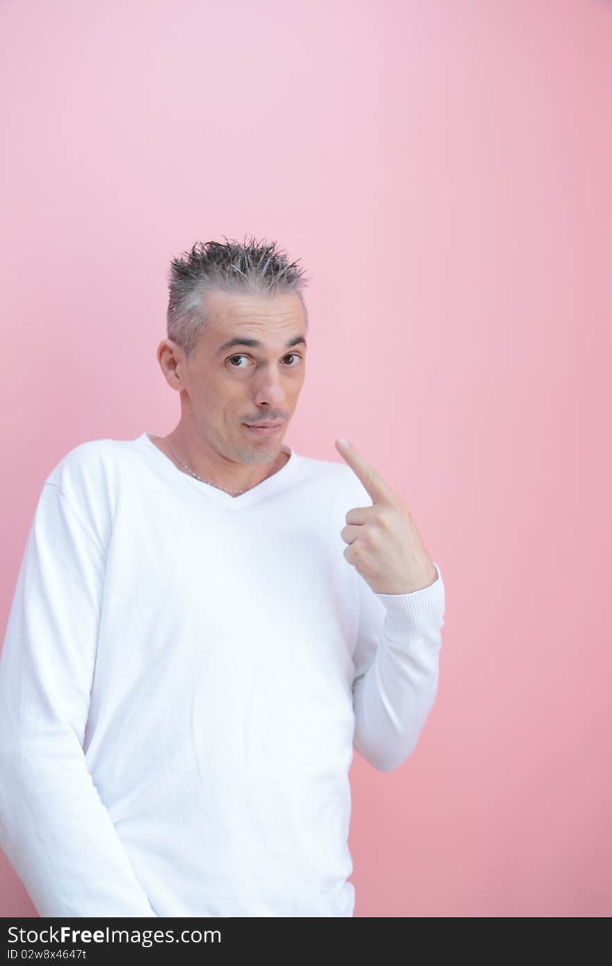 Man in white shirt points to himself with an expression of innocent man. Man in white shirt points to himself with an expression of innocent man