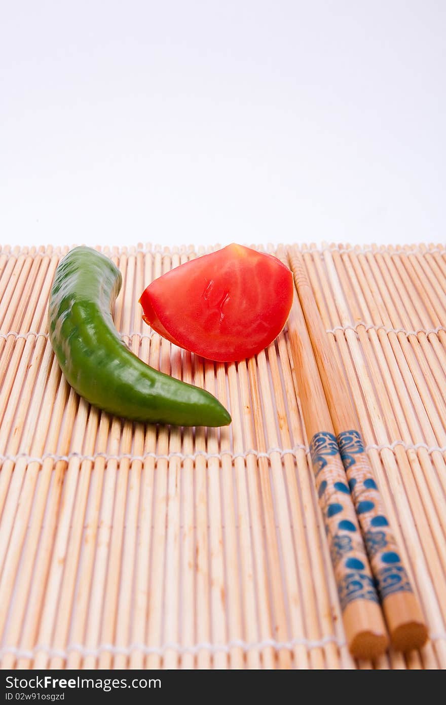 Peppers, tomatoes, sticks