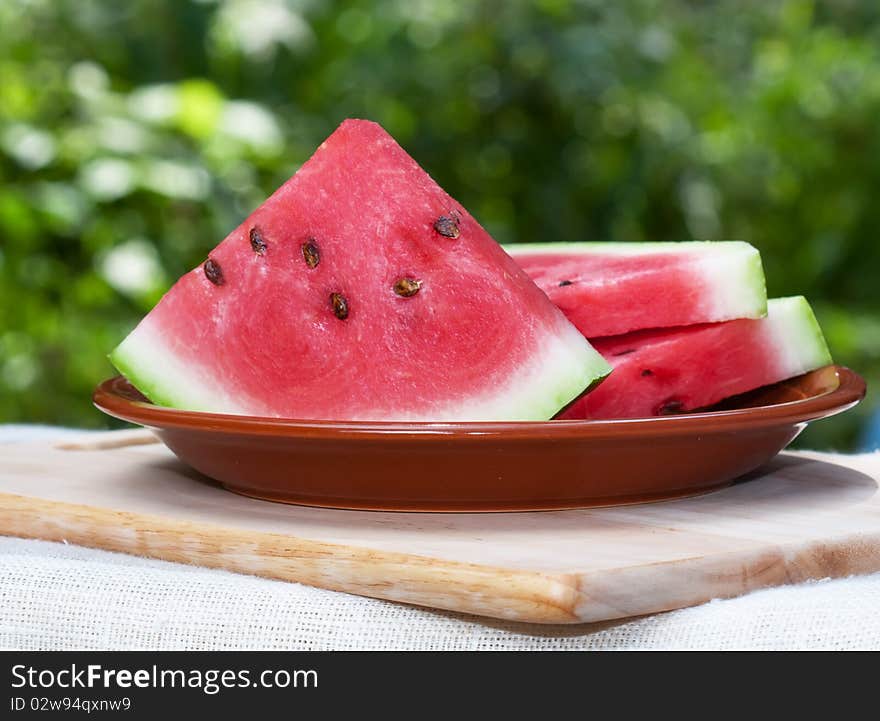 Fresh watermelon slices on a white background