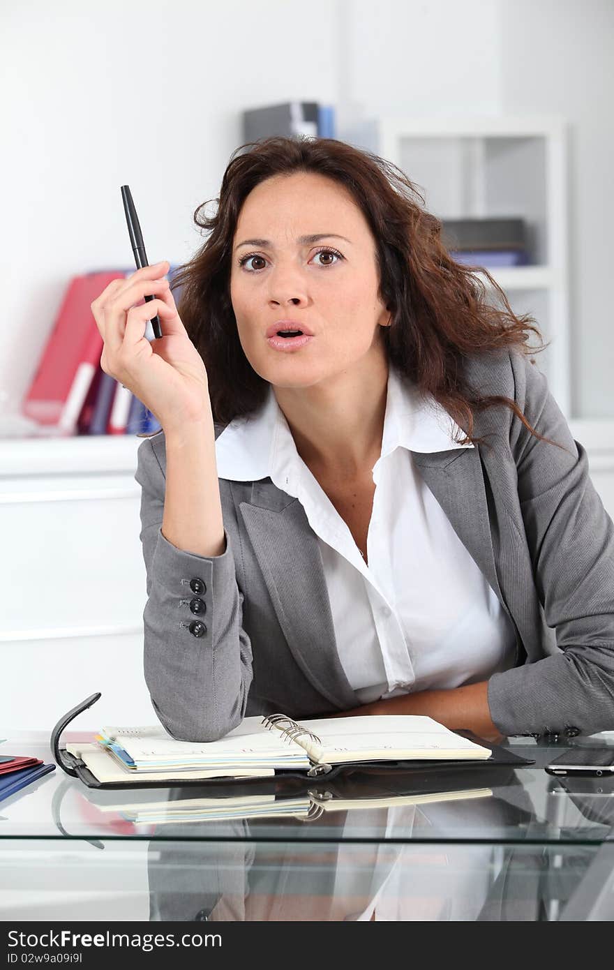 Businesswoman in a work meeting. Businesswoman in a work meeting