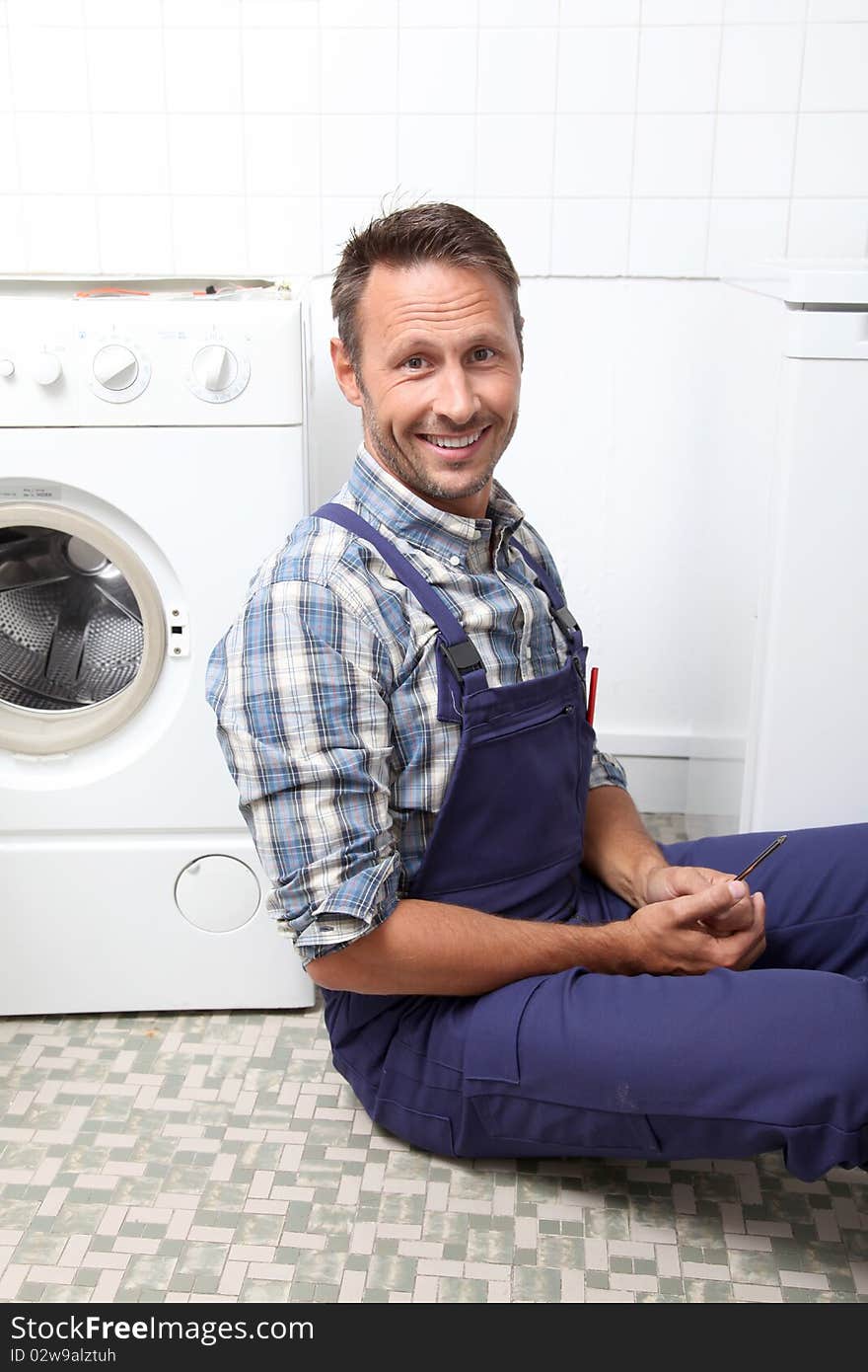 Portrait of smiling plumber