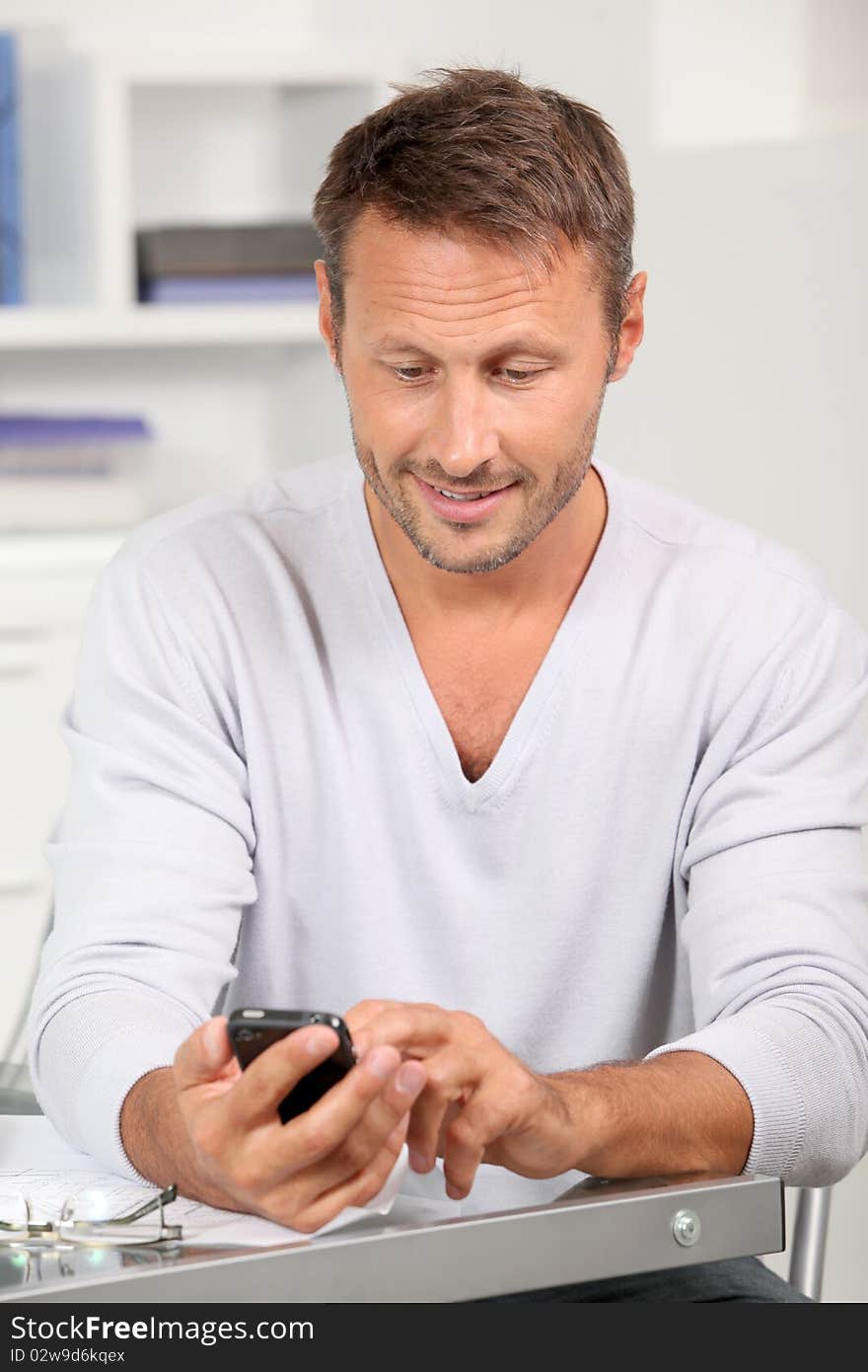 Portrait of man using mobile phone