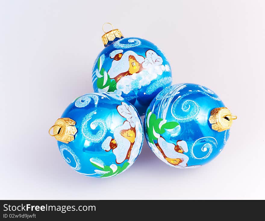 Christmas blue spheres on the white background