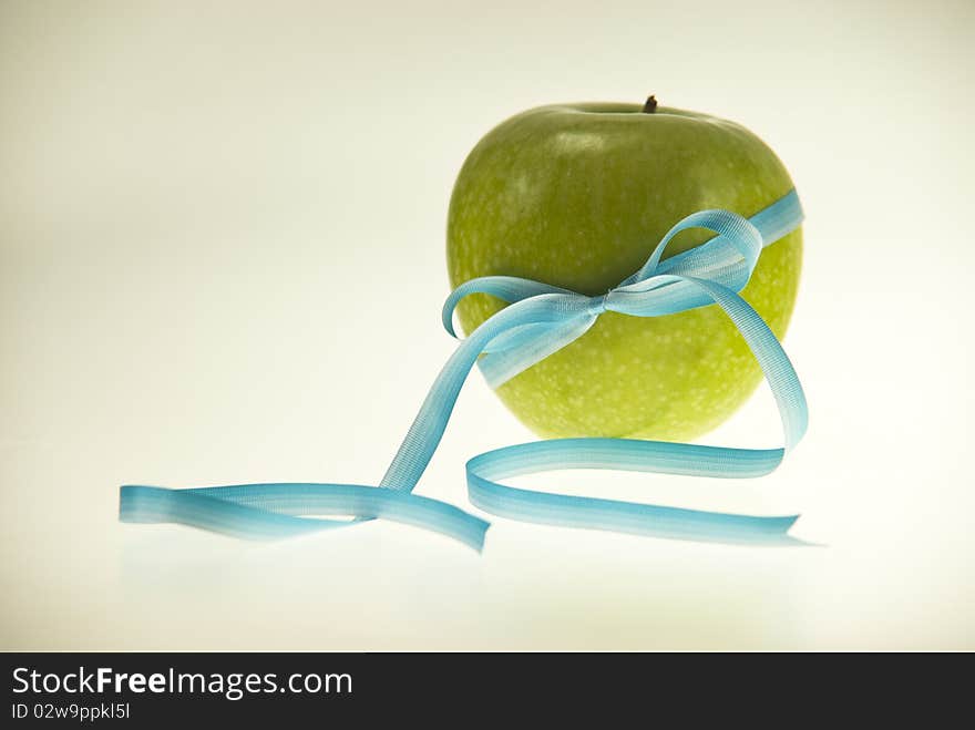 Apple with blue-white ribbon diet