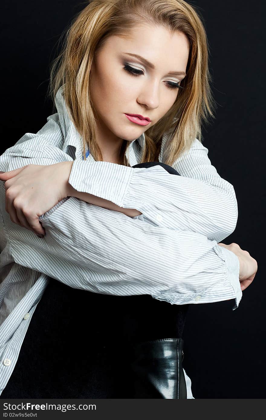 Beautiful fashioned woman on black background