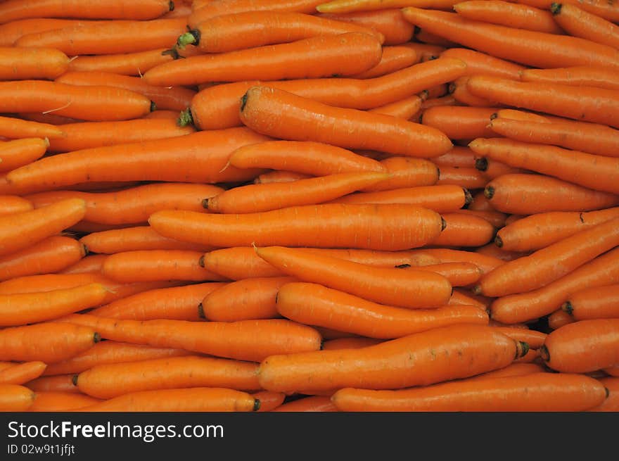 Natural texture with fresh carrots waiting for sale