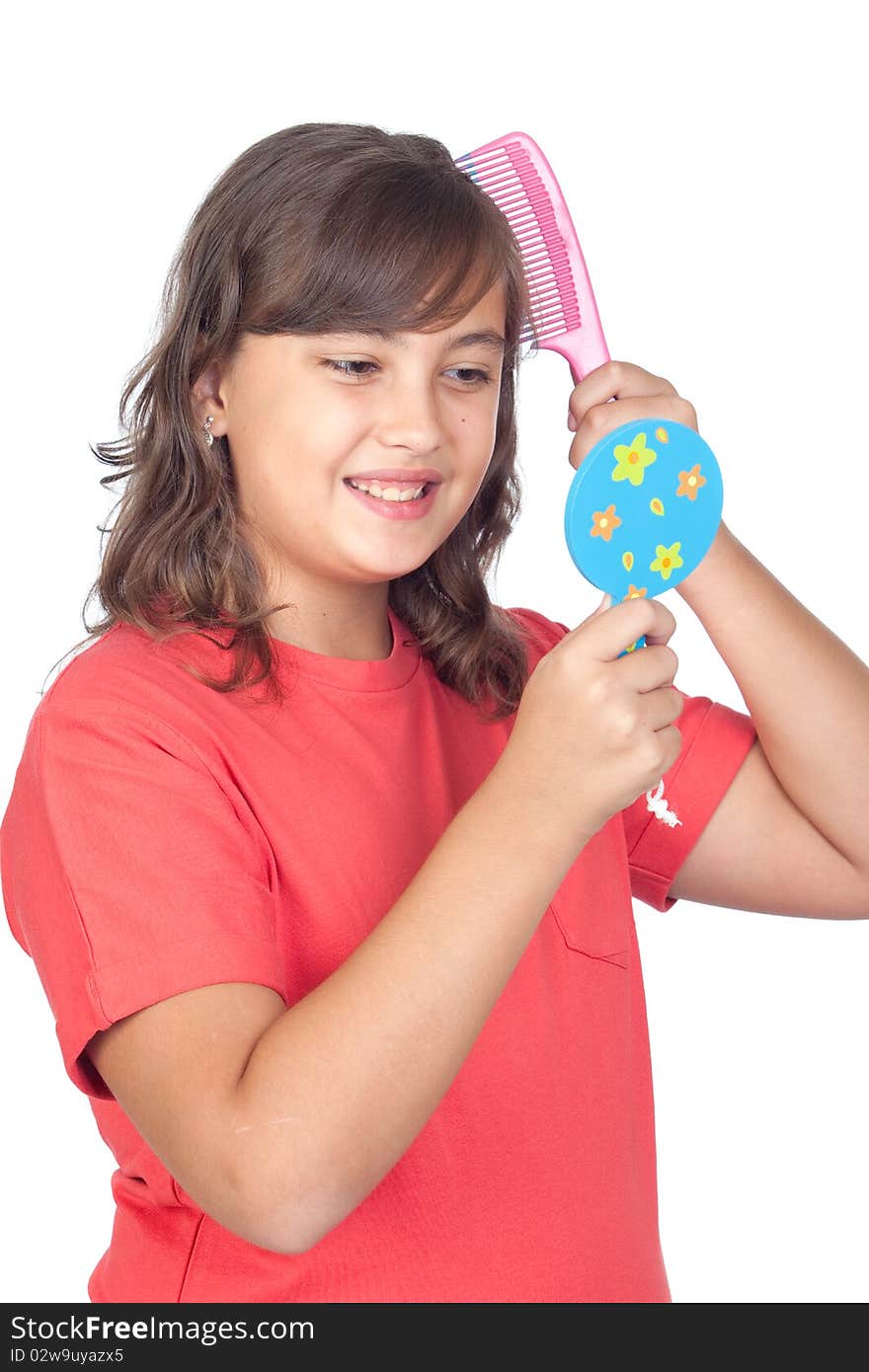 Preteen girl combing with a comb