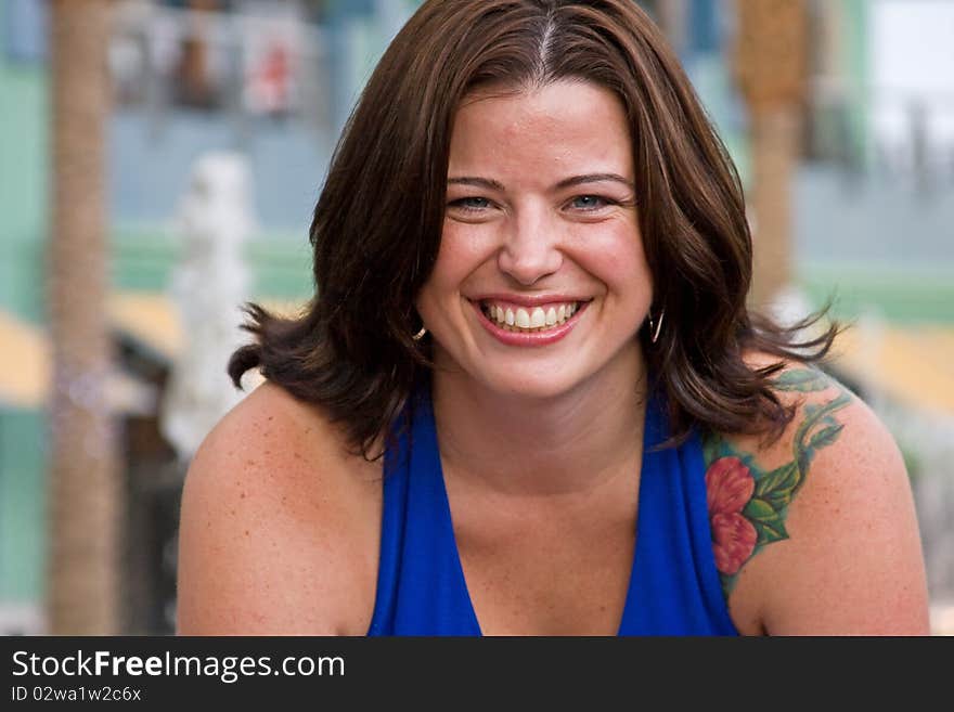 A portrait of a smiling young woman. A portrait of a smiling young woman.