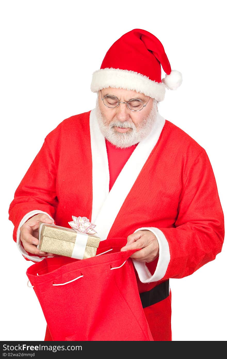 Santa Claus getting a gift from his sack