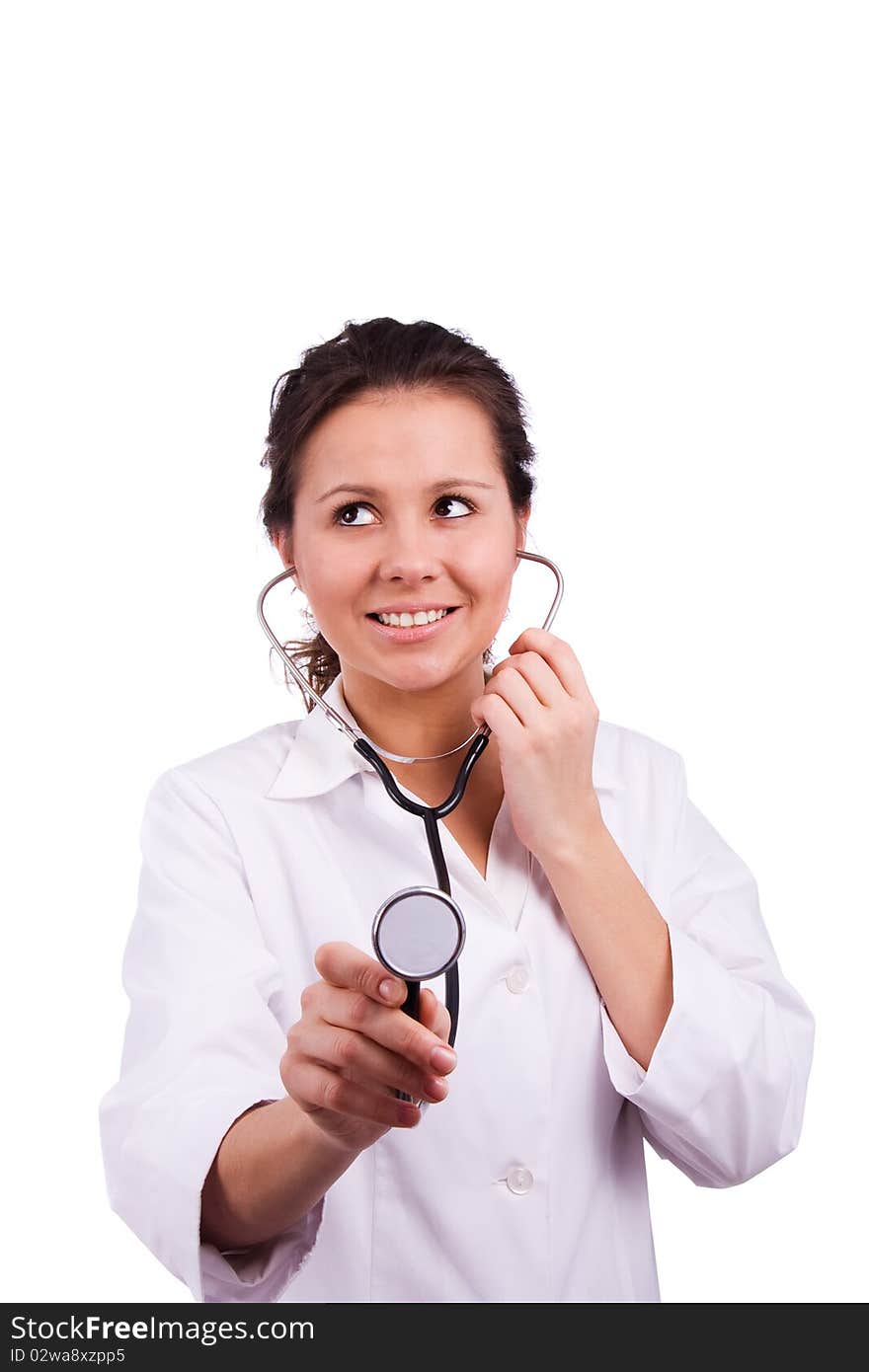 Close-up of a female doctor smiling with stethoscope. Woman Doctor At The Hospital. Close-up of a female doctor smiling with stethoscope. Woman Doctor At The Hospital