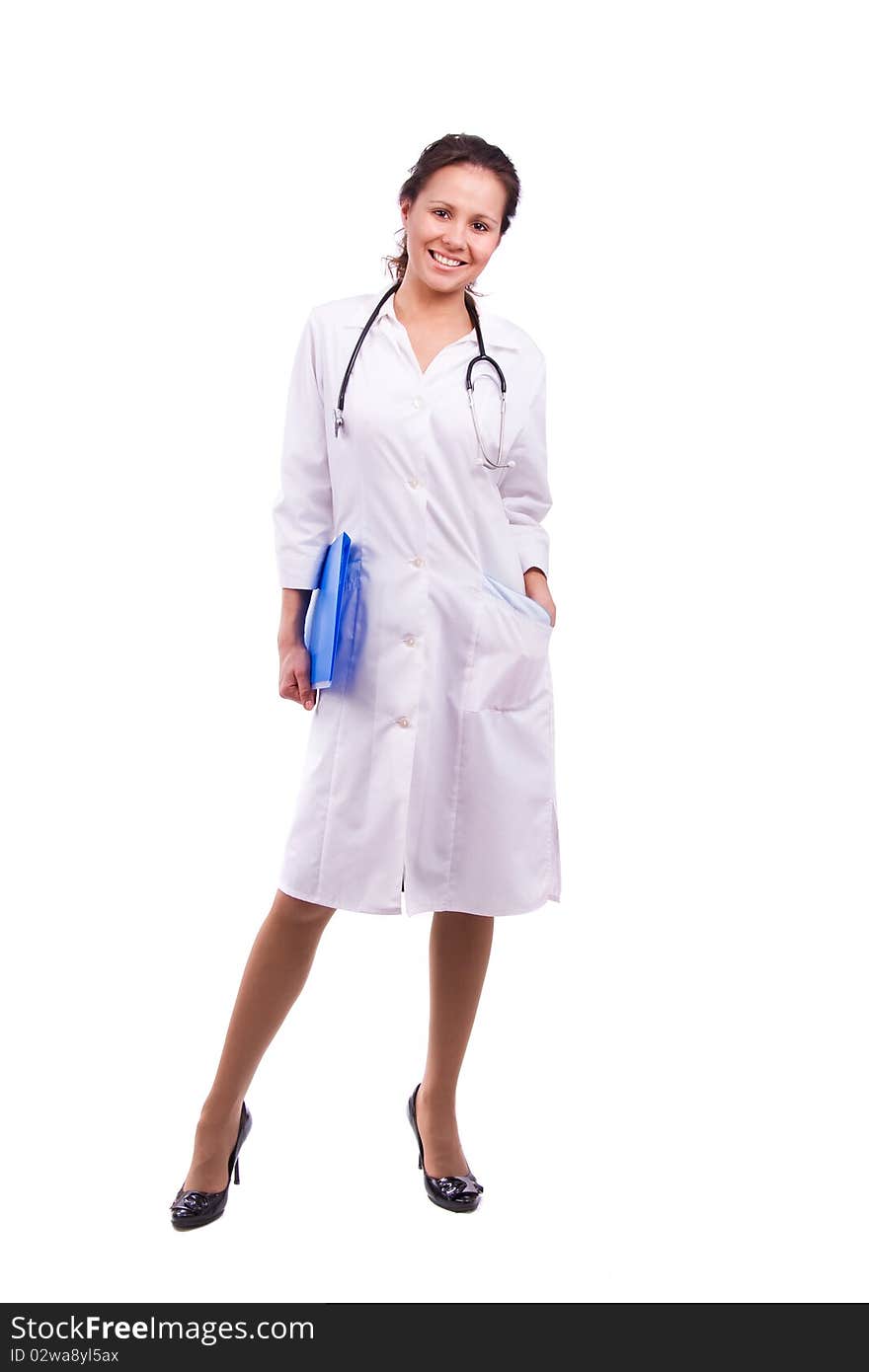 Smiling female doctor holding some folders. Isolated on white. Smiling female doctor holding some folders. Isolated on white.