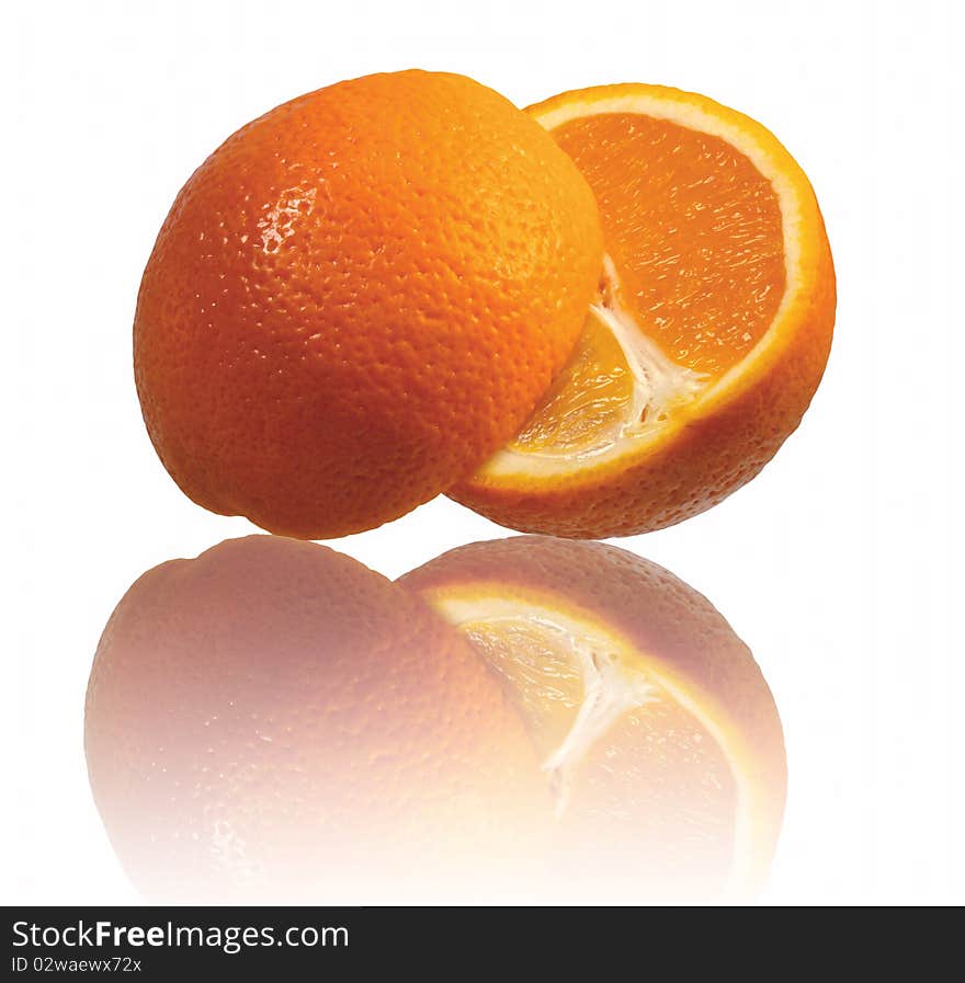 Single orange on a white isolated background using macro lens. Single orange on a white isolated background using macro lens