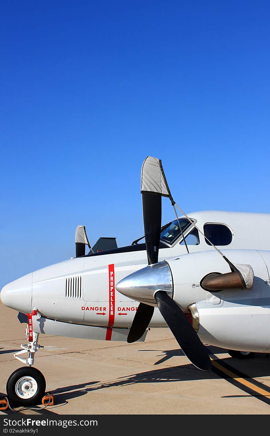 Propeller plane parked at the airport