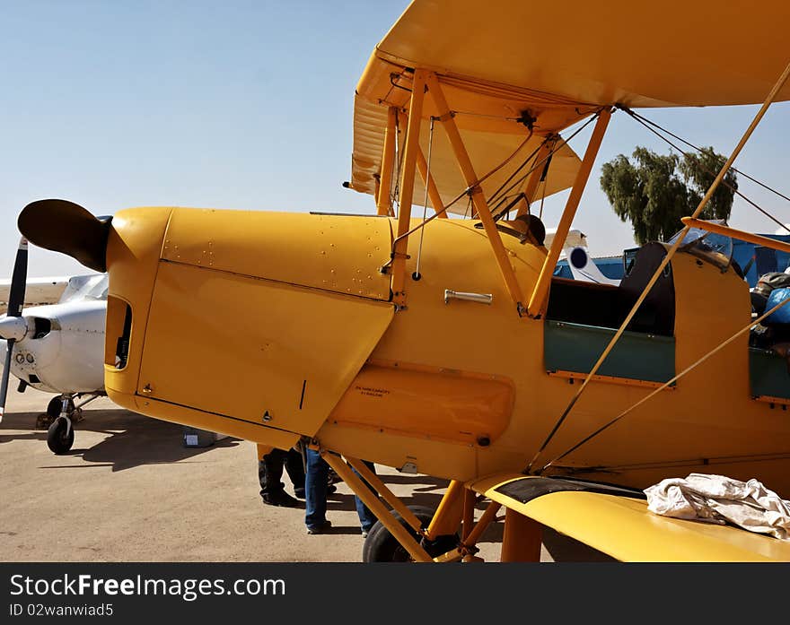 Front of an orange old airplane