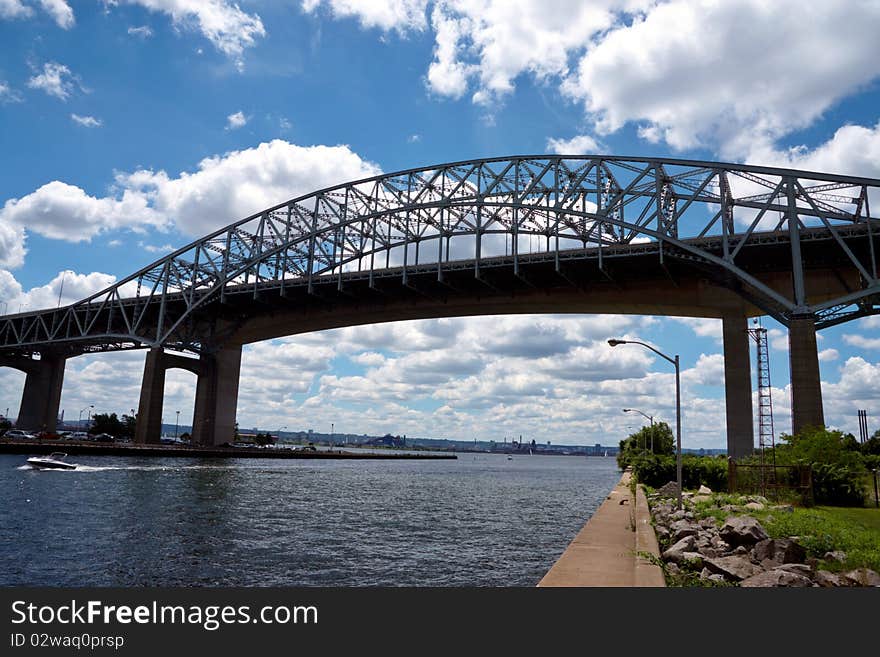 Long iron bridge over a river