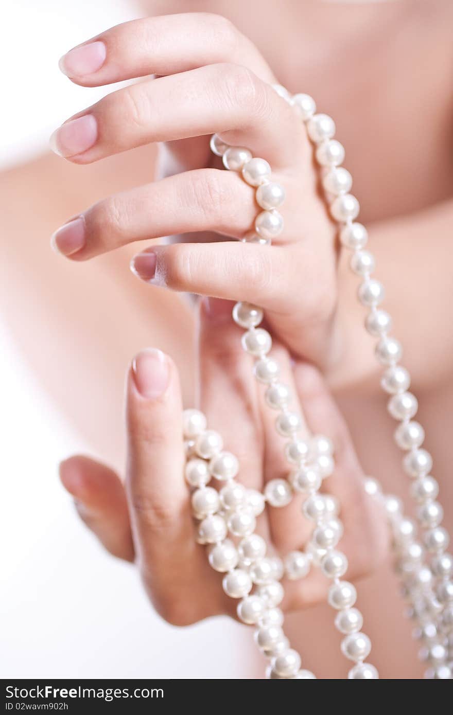 Pearls in the women s hands