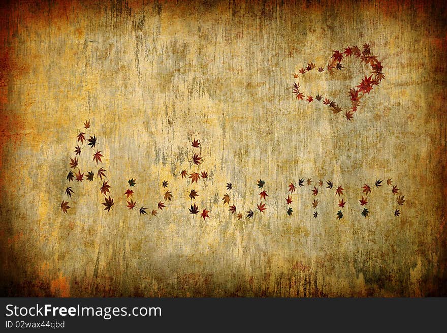 Grunge background with autumn letters and heart shape made by leaves