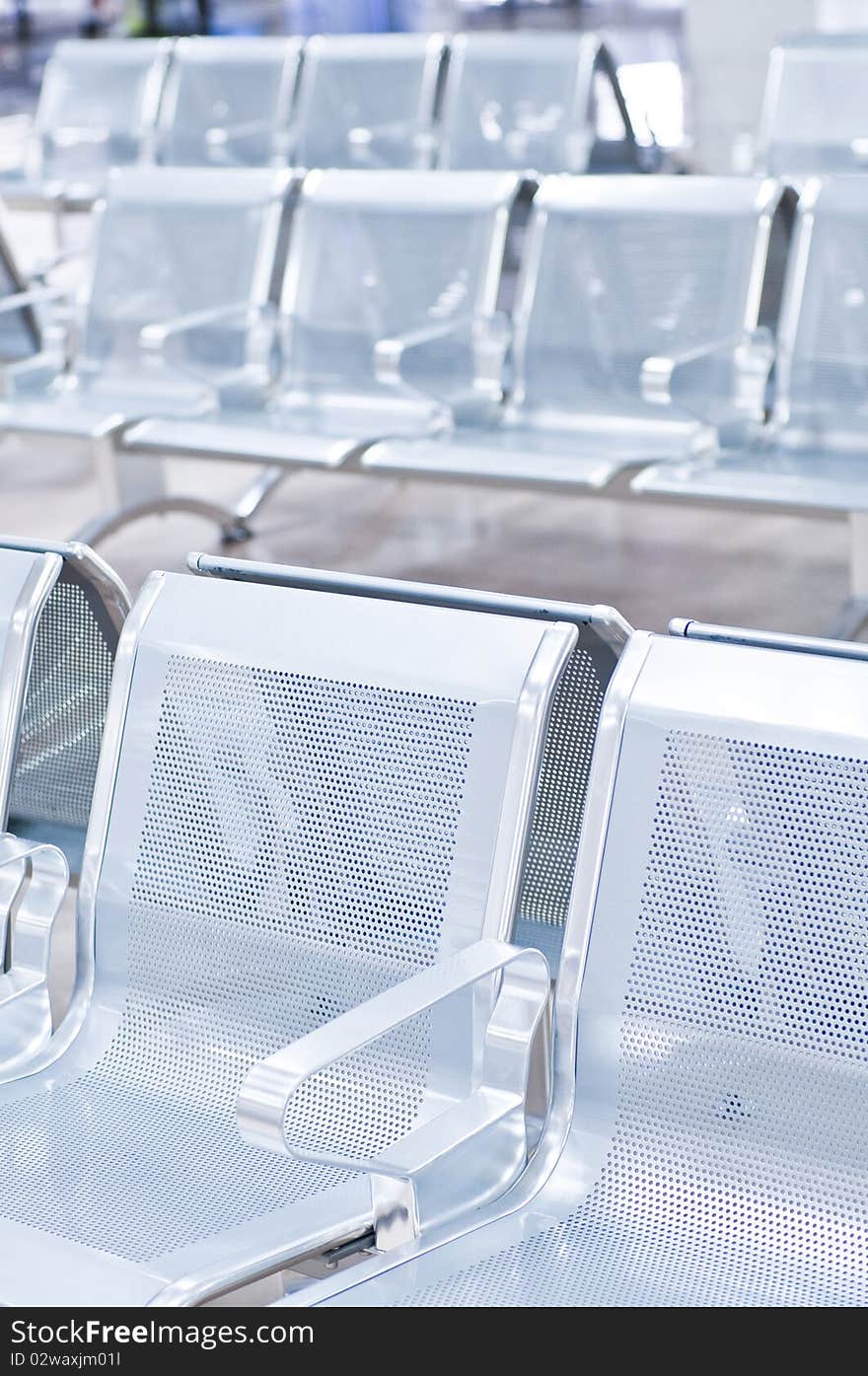 Empty airport chairs