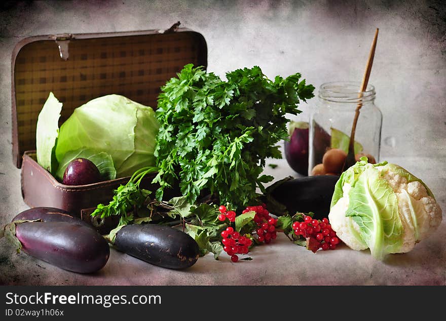 Vegetables and suitcase